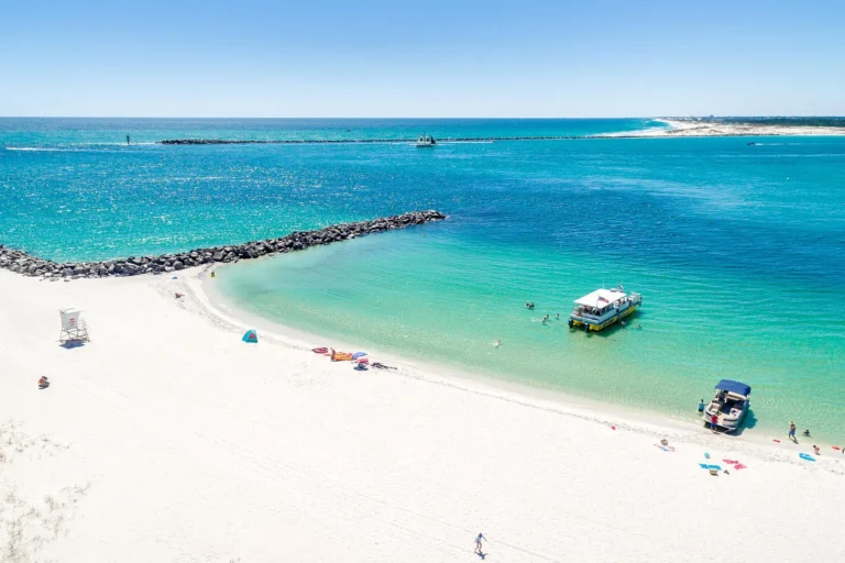 Colorful beach umbrellas set up along Destin beach